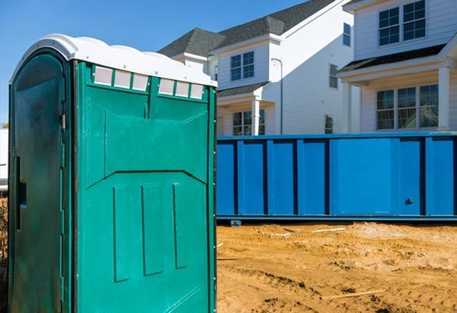 practical and convenient portable toilets at a bustling job site